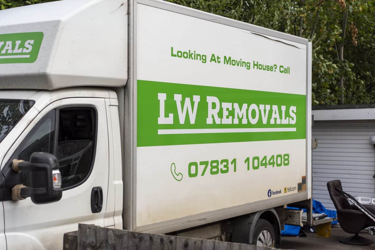 LW Removals team loading the branded removal van